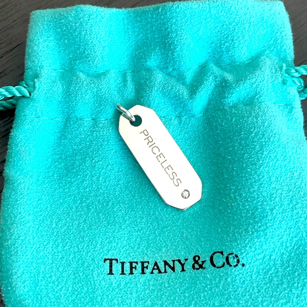 Tiffany & Co Sterling Silver “Priceless” Charm with Tiffany Diamond.